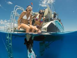 Guests on platform entering water
